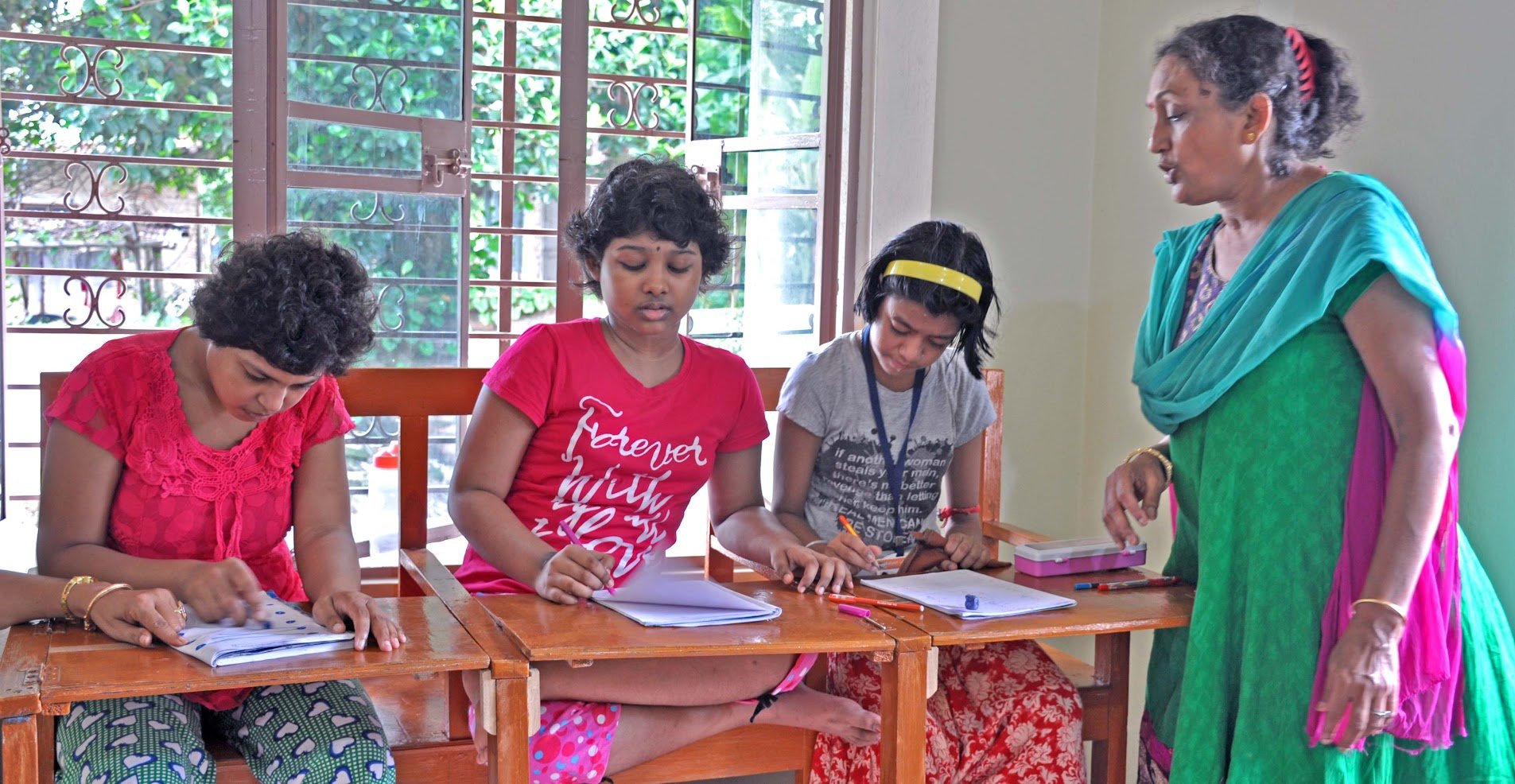 Students learning with abacus in classroom at Kalyani Life Institute